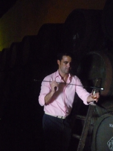 Trying sherry from the traditional venencia, which is dipped into the cask, at Bodegas Rey Fernando de Castilla